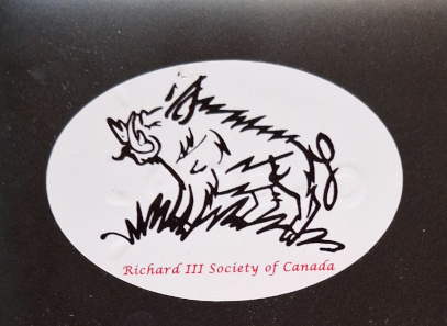 oval white sticker with the outline in black of a boar standing on grass. Beneath the figure it says Richard III Society of Canada